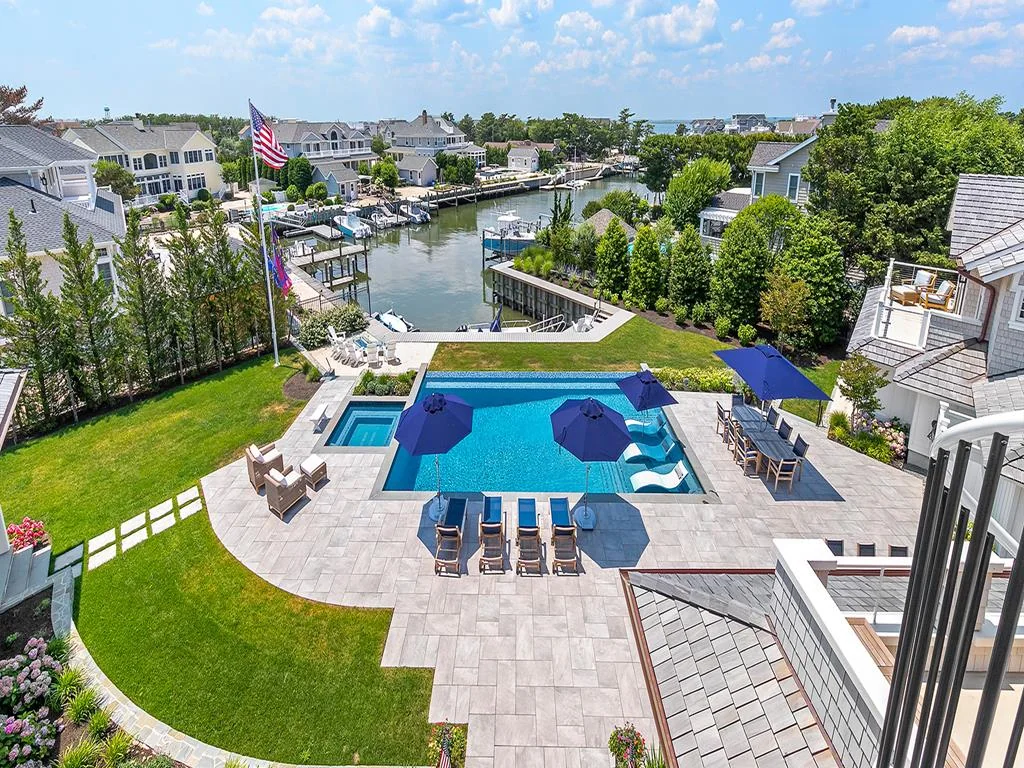 LBI property with a pool and landscaped lawn