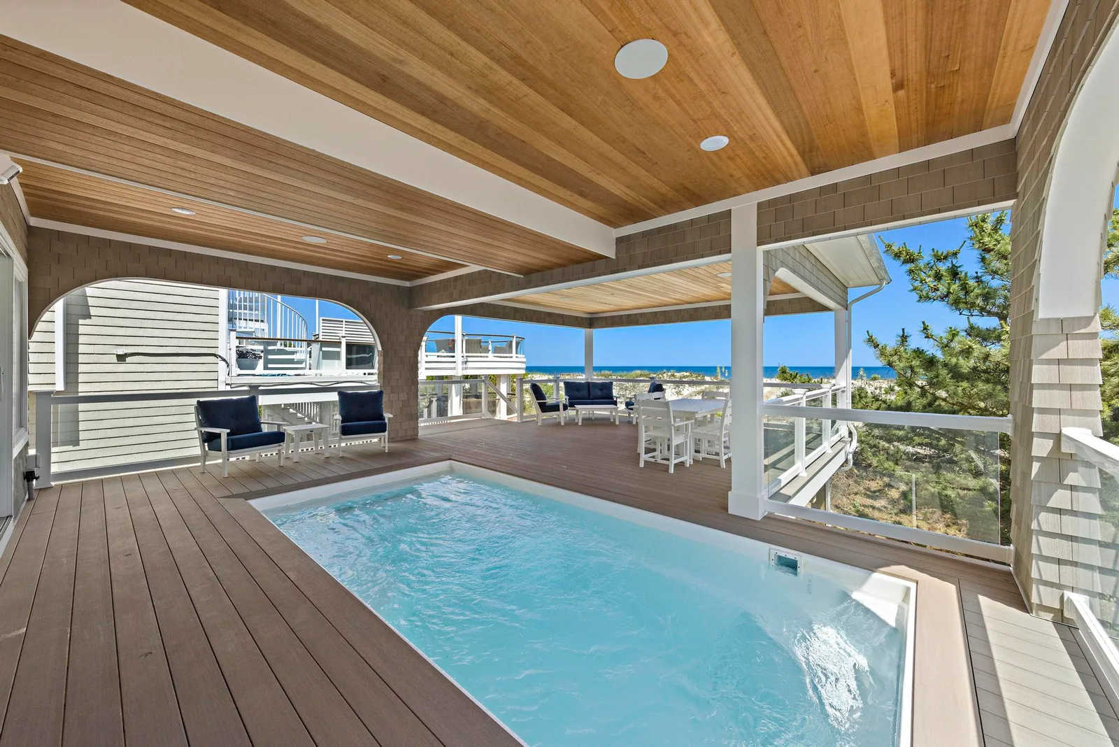 Covered hot tub and outdoor living area